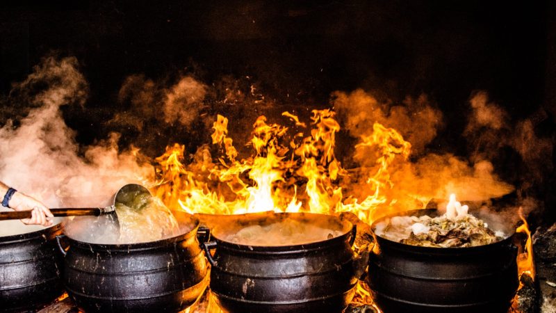 Time Lapse Photography of Four Black Metal Cooking Wares